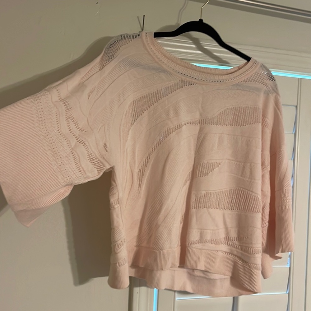This baby pink sweater is so pretty. Needs a cami underneath